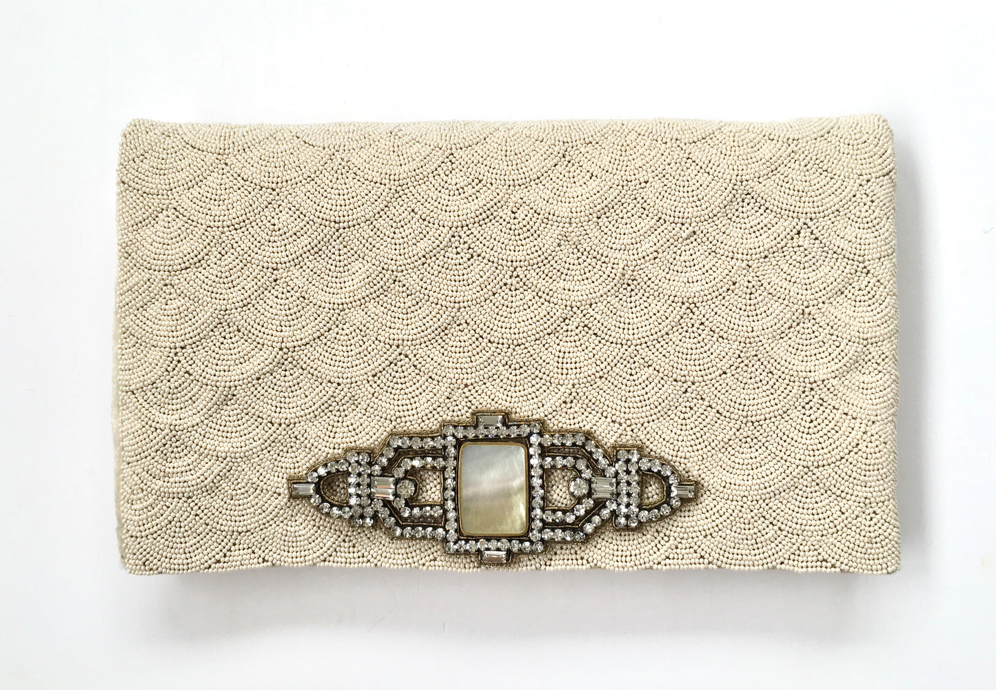 THE MICRO SCALLOP CLUTCH