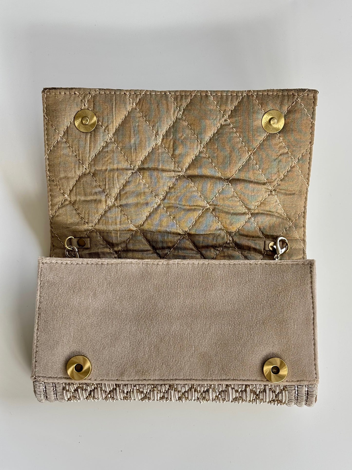 THE PIQUÉ CLUTCH