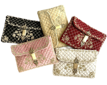 THE DELPHINE CLUTCH