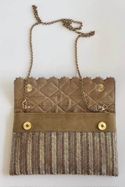 THE FLORENTIA CLUTCH