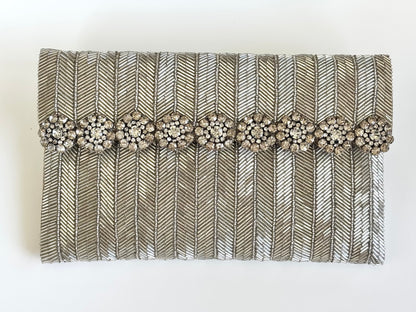 THE FLORENTIA CLUTCH