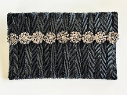 THE FLORENTIA CLUTCH