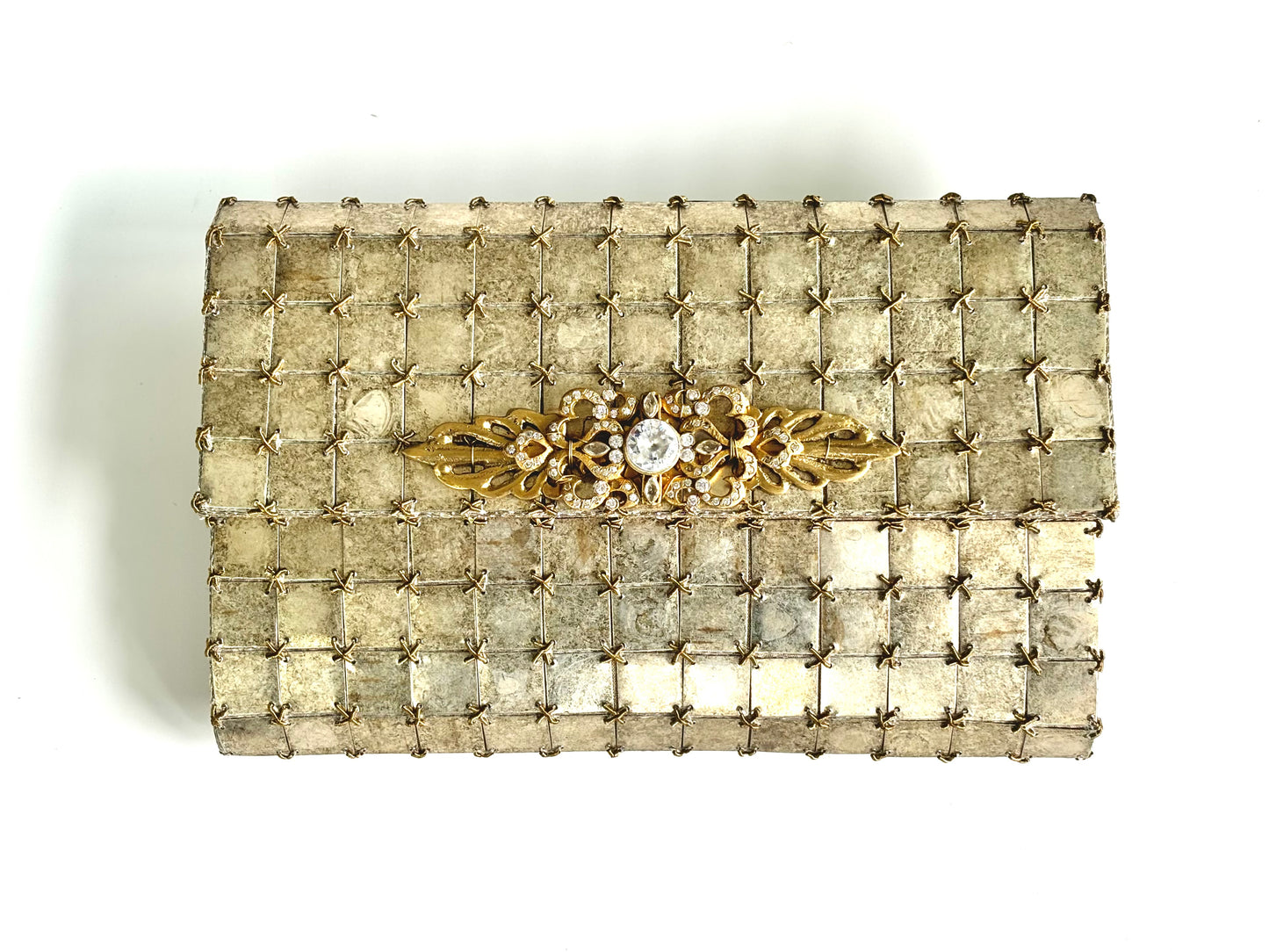 THE BURNT METAL CLUTCH