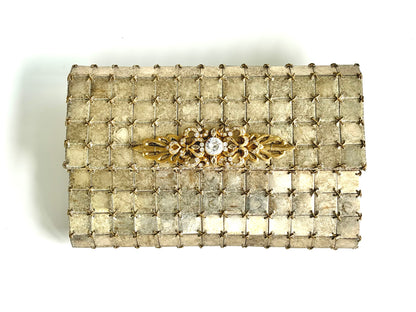 THE BURNT METAL CLUTCH