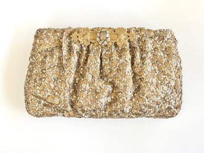 THE SOLENNE CLUTCH