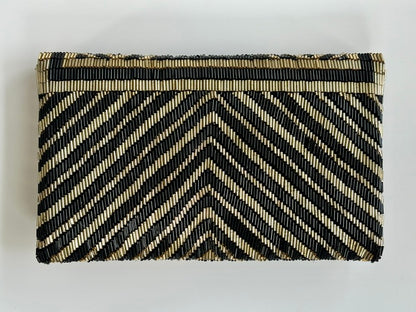 THE MANHATTAN CLUTCH