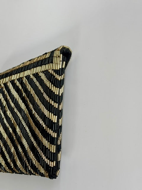 THE MANHATTAN CLUTCH