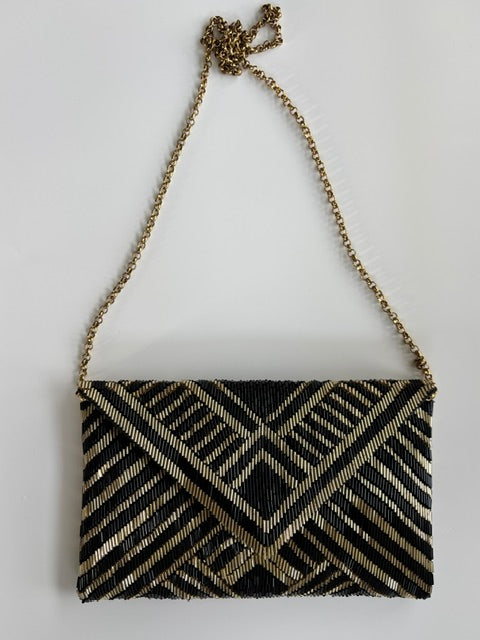THE MANHATTAN CLUTCH