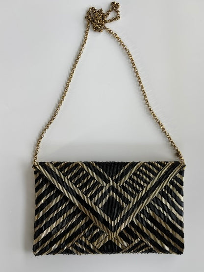 THE MANHATTAN CLUTCH