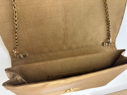 THE CUIR CLUTCH